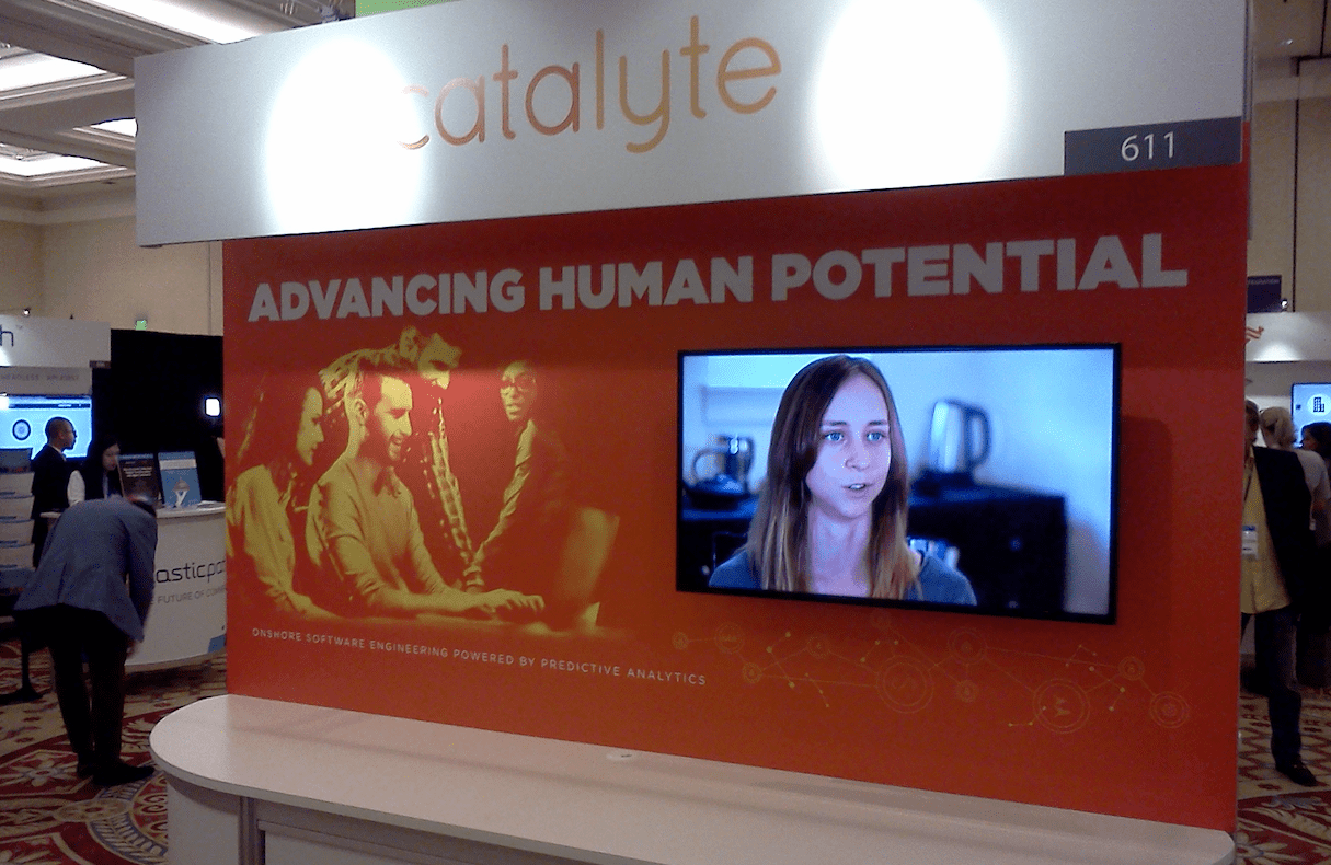 Catalyte booth at a trade show which reads: Advancing human potential