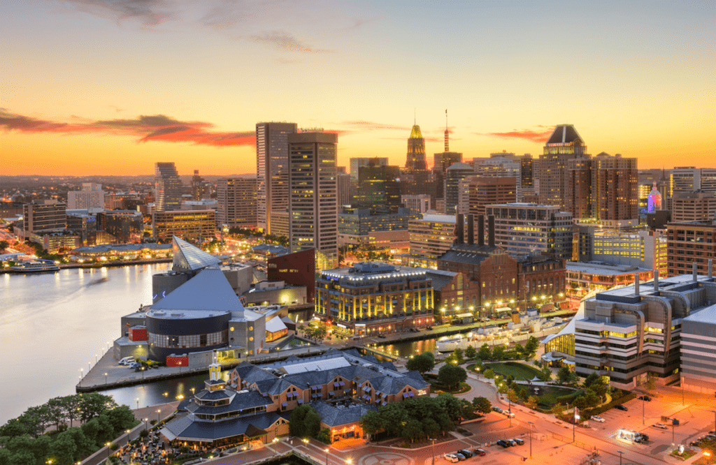 Baltimore's Inner Harbor at sunset. Cities like Baltimore are using Catalyte for junior tech talent.