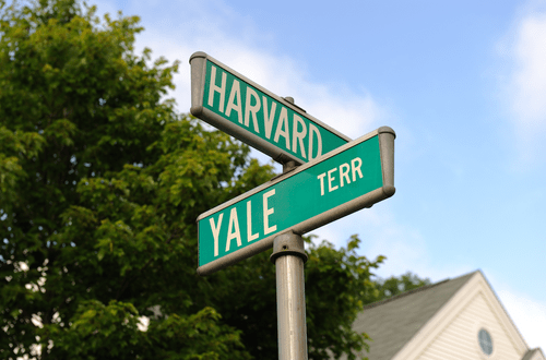 Street signs reading Harvard and Yale Terr