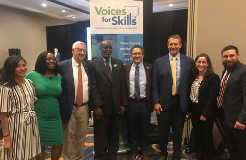 Group photo of 8 people involved in Voices for Skills panel event