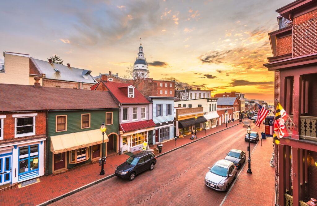 Annapolis, Maryland, USA downtown view over Main Street with the State House at dawn.