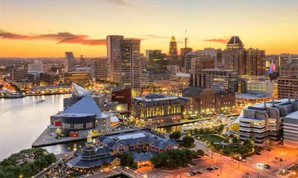 Baltimore's Inner Harbor at sunset. Cities like Baltimore are using Catalyte for junior tech talent.