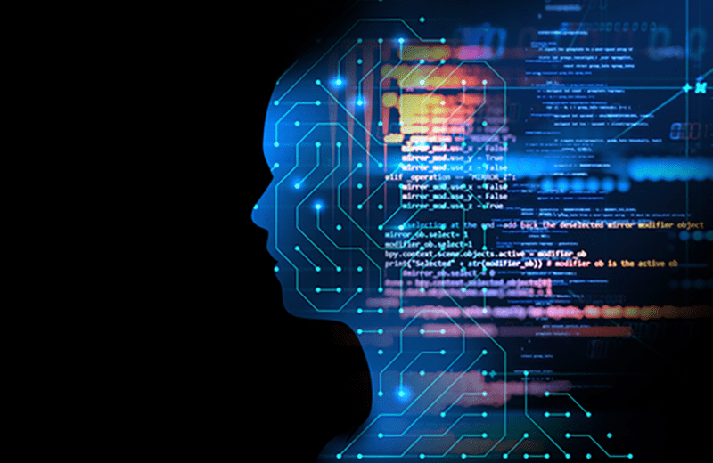 Outline of human face on black background. Face is overlayed with images of circuit boards.