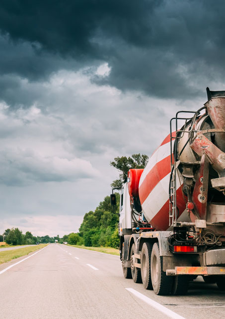 Cement truck driving on a highway