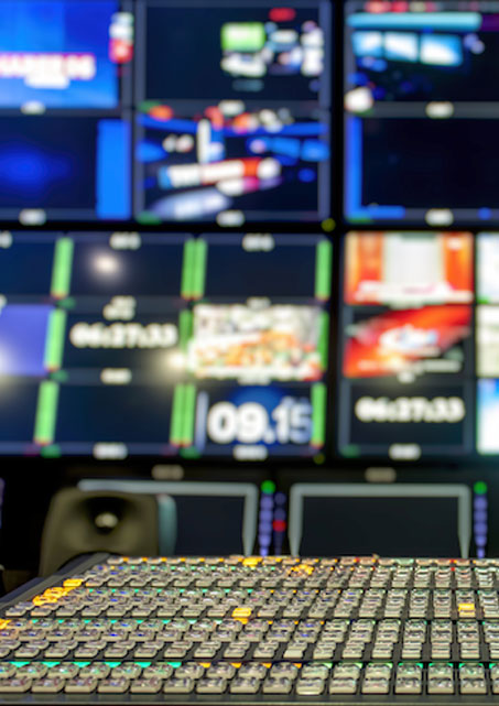 TV control room with multiple screens